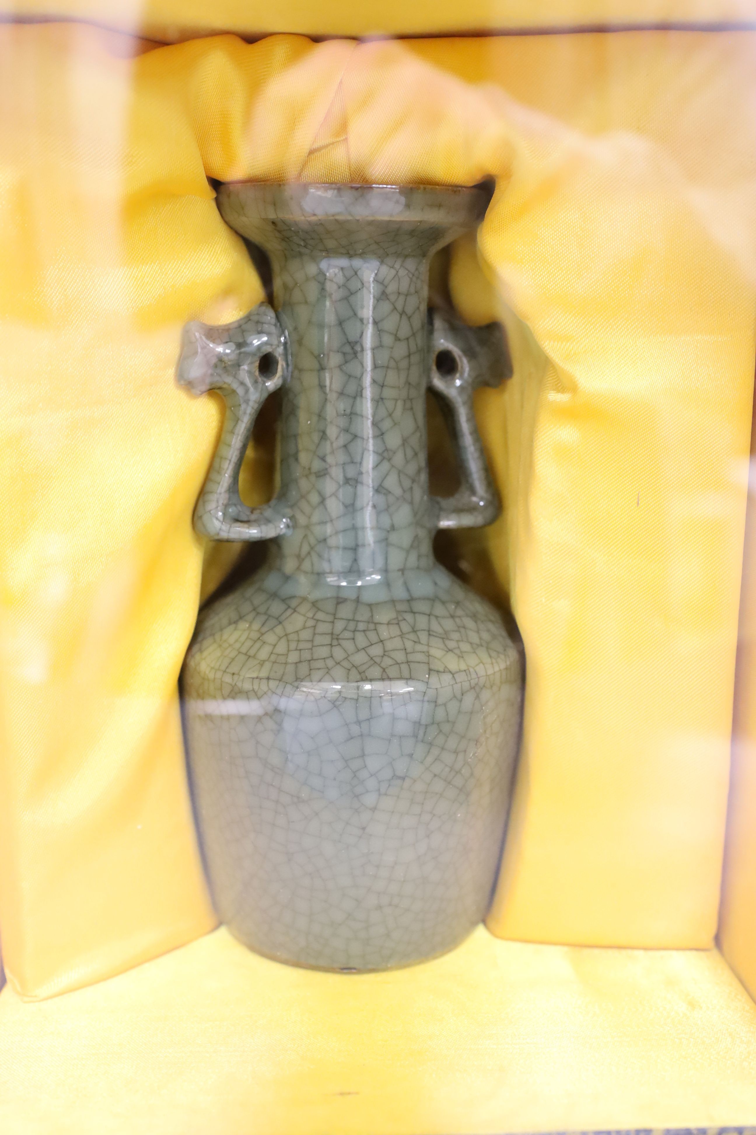 A group of Chinese monochrome ceramics, comprising two crackle glaze vases, tallest 21 cm, one cased, a Jun type dish and tripod censer a leaf impressed bowl and another bowl